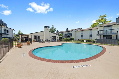 the preserve at ballantyne commons community swimming pool with apartment buildings