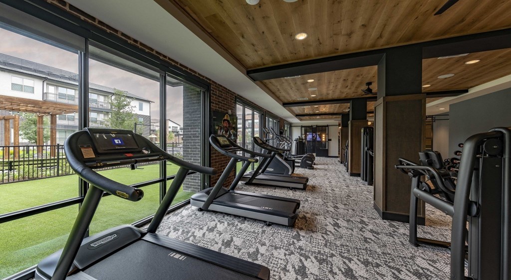 the gym is equipped with treadmills and other exercise equipment