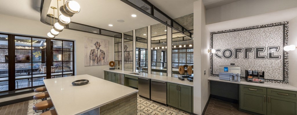 a kitchen with a counter and a coffee shop