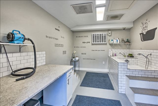 a bathroom with a sink and a bathtub