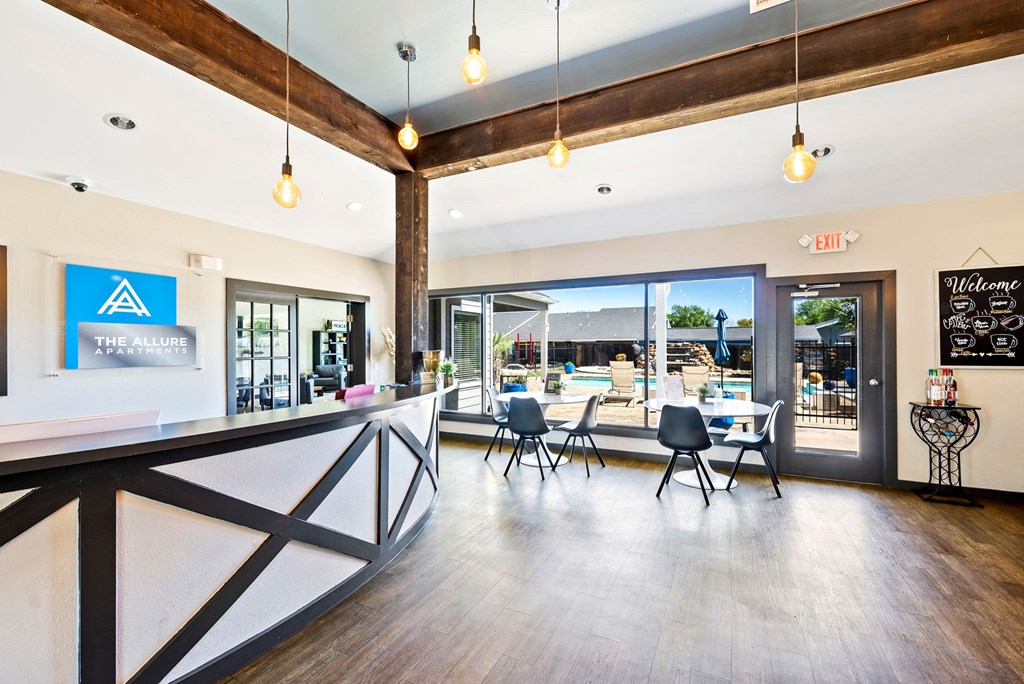 A reception area with a blue sign that says