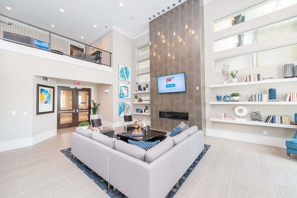 a living room with a couch and a table