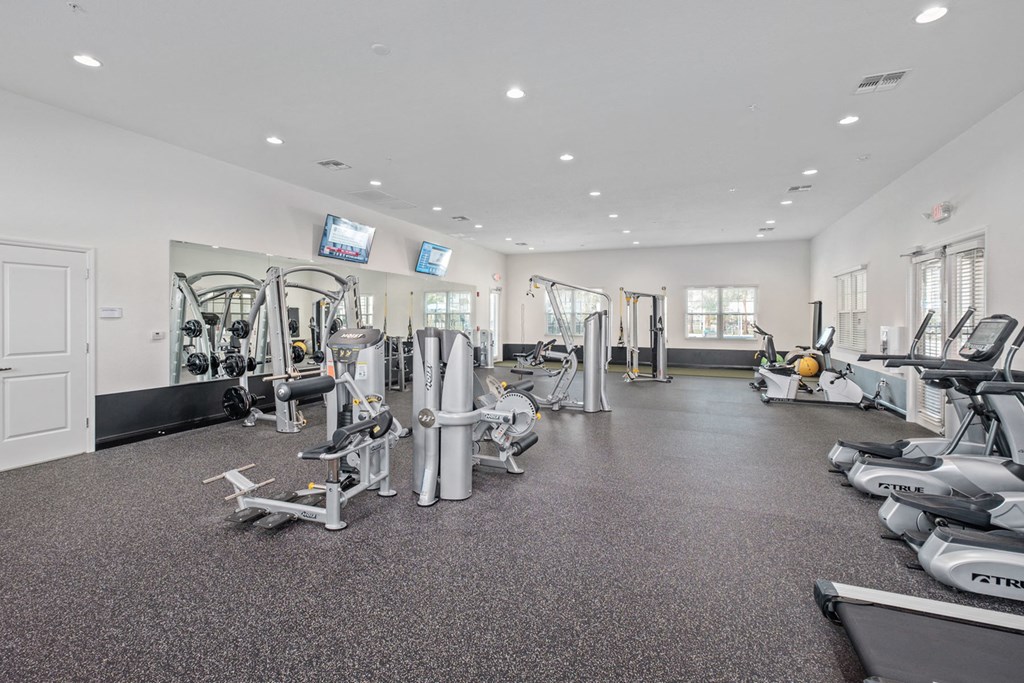the gym at the flats at big tex apartments