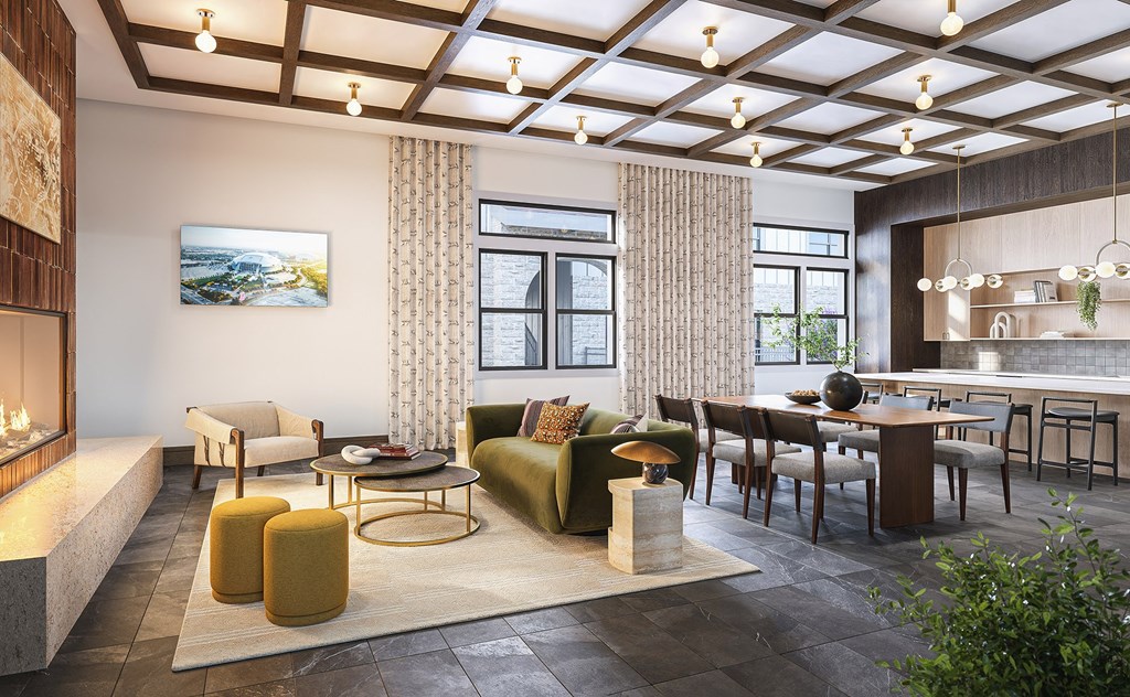 A modern living room with a fireplace and a painting on the wall.