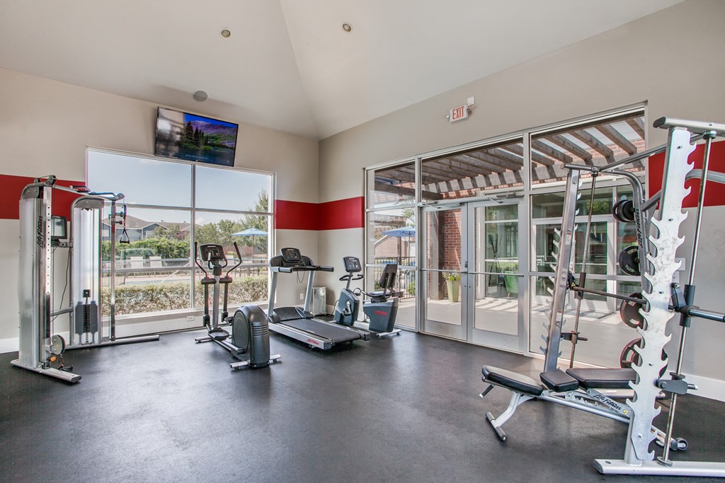 the gym at the flats at big tex apartments