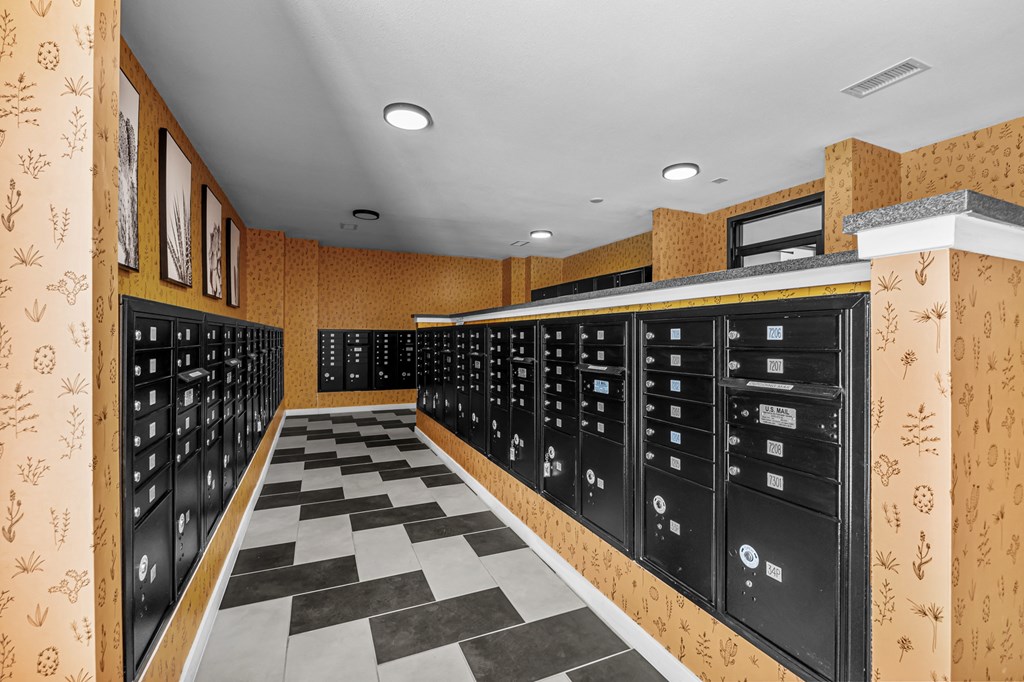 a locker room with a checkered floor and a bunch of lockers