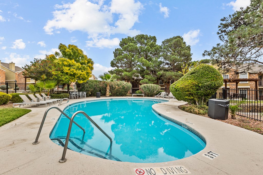 the sparkling swimming pool at our apartments