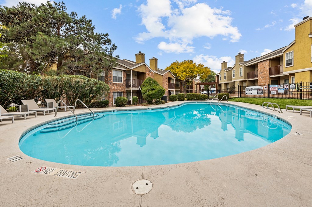 the preserve at ballantyne commons community swimming pool with apartment buildings