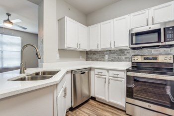 kitchen with silver appliances - Photo Gallery 2