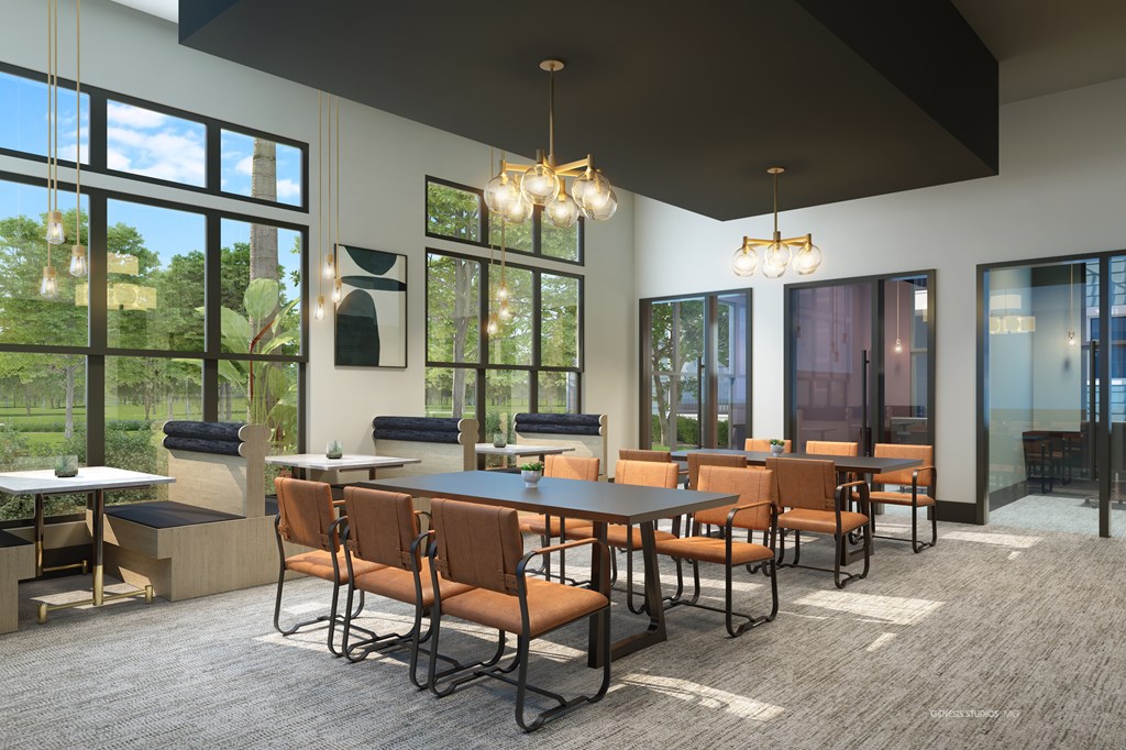 A conference room with a long table and chairs.