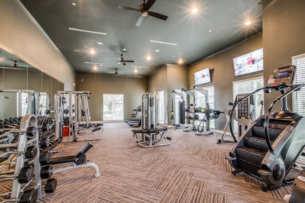 take advantage of the fitness center at the enclave at woodbridge apartments in sugar land, tx