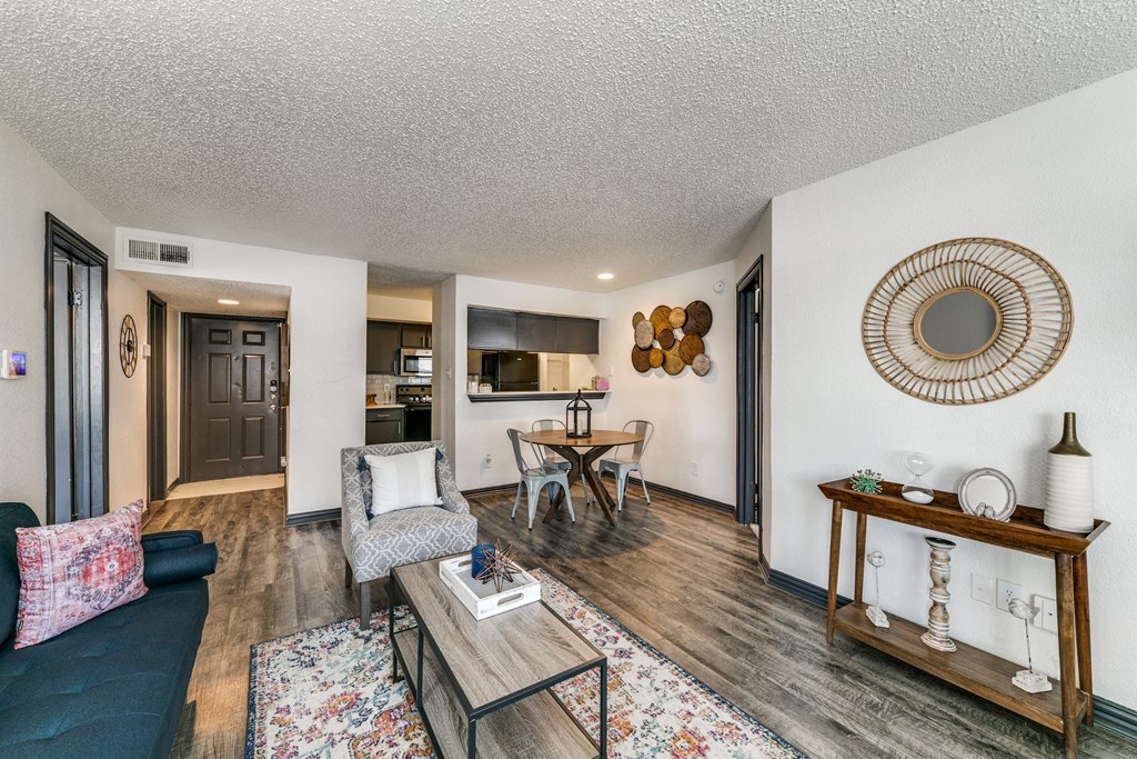 a living room with a couch and a table