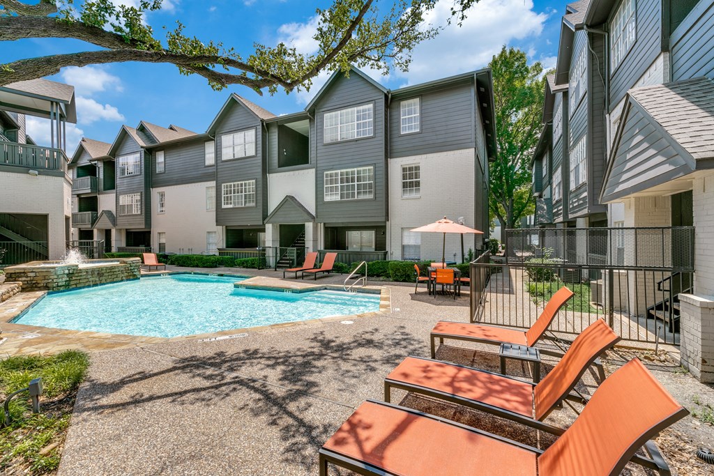 our apartments have a large pool and lounge chairs