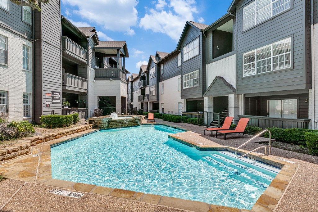 our apartments have a pool and lounge chairs