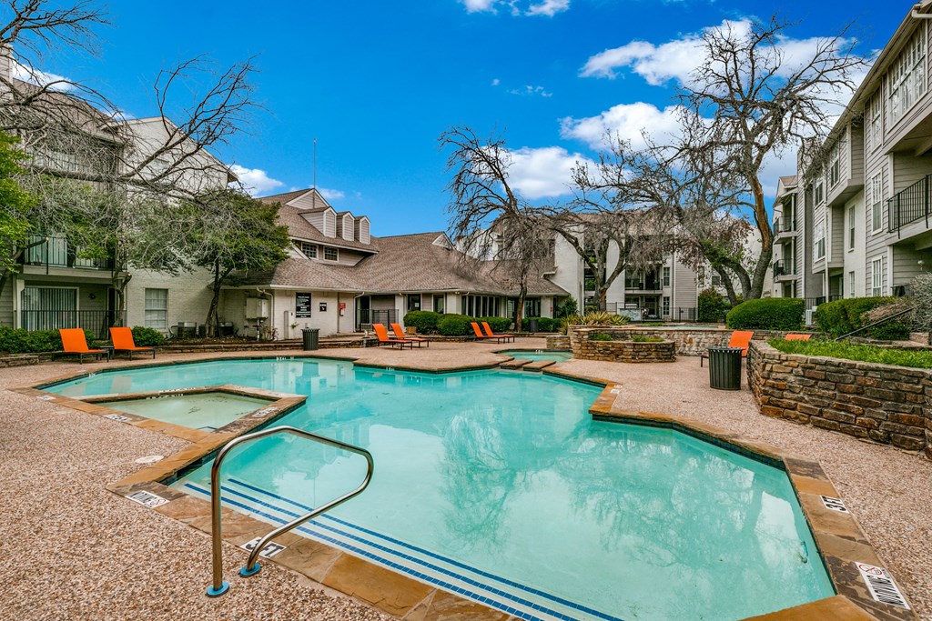 the swimming pool at the preserve at polo terrace apartments