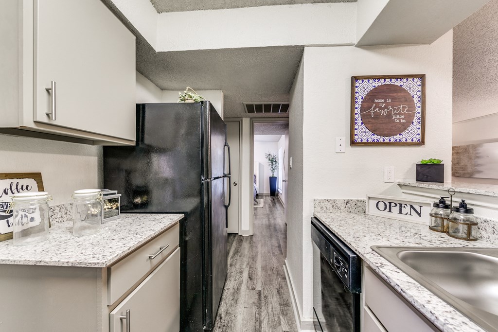 our apartments have a modern kitchen with granite counter tops and stainless steel appliances