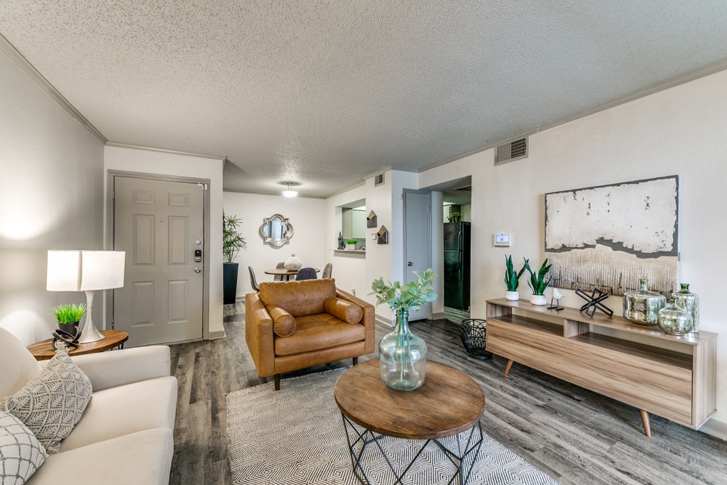 a living room with a couch and a table