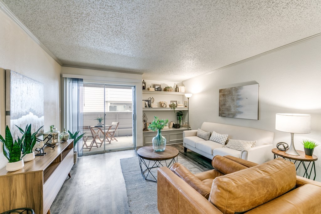 a living room with a couch and a table