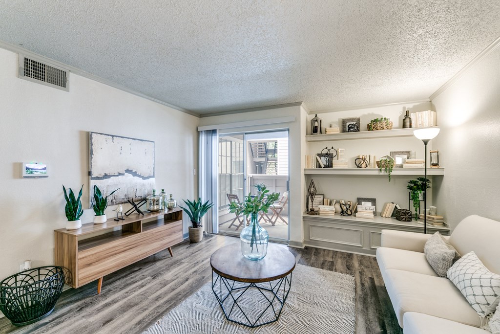 a living room with a couch and a table