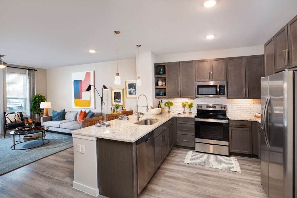 side view of the kitchen with over view of the living room