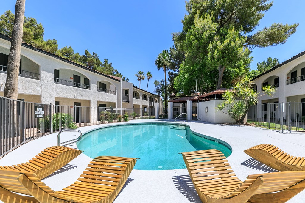 our apartments have a large pool and lounge chairs