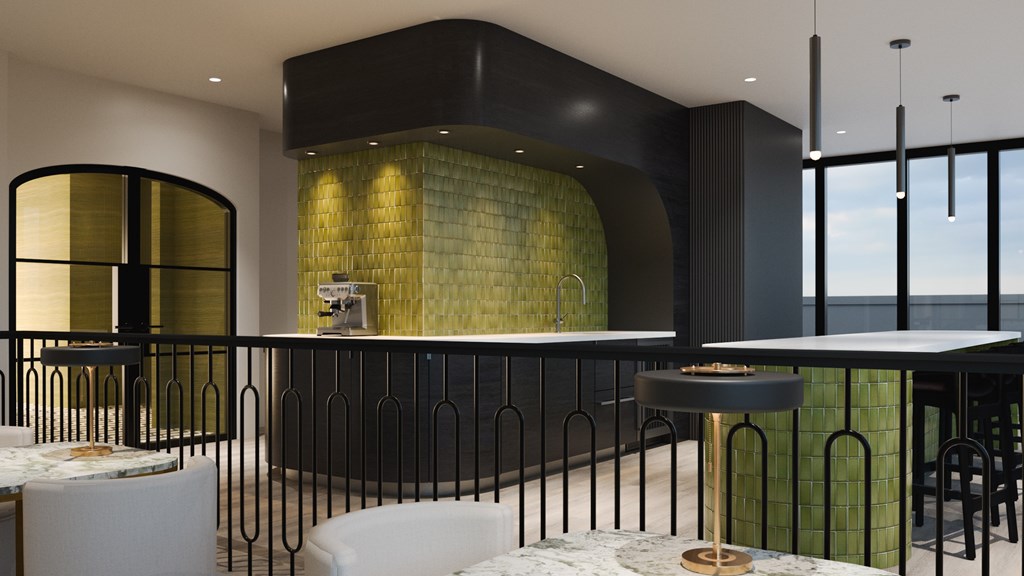 A modern dining area with a glass wall and black railings.