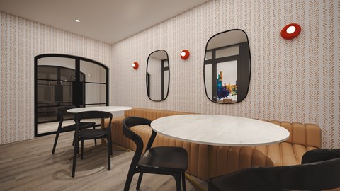 A modern dining area with a round table and chairs.