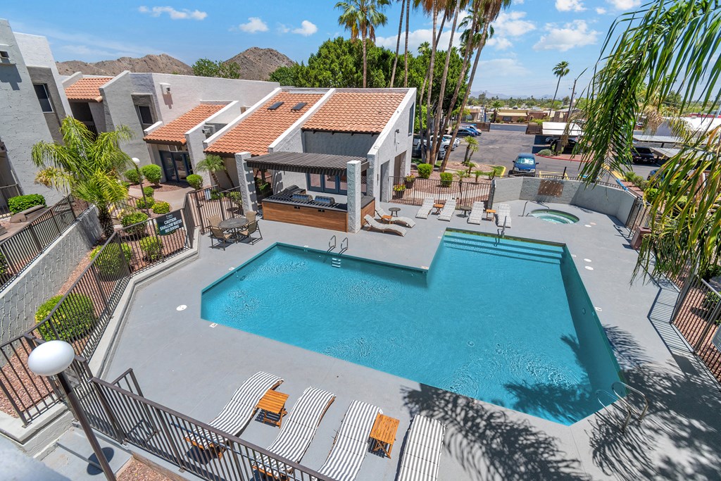 take a dip in the pool at the enclave at woodbridge apartments in sugar land, tx