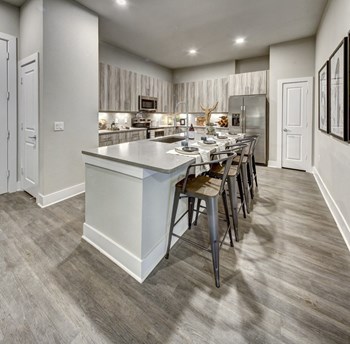 kitchen area in east riverside apartments - Photo Gallery 4