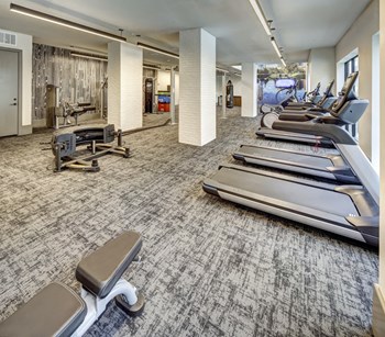 resident fitness center in east riverside apartments - Photo Gallery 24