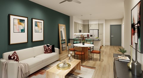 A living room with a white couch and a coffee table.