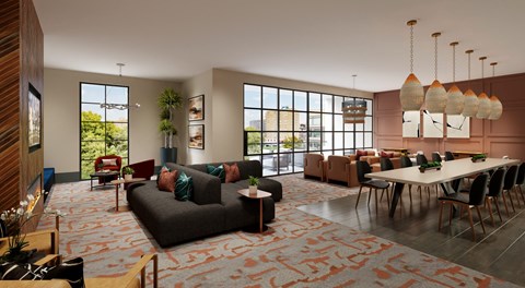 A modern living room with a large couch and a long table.