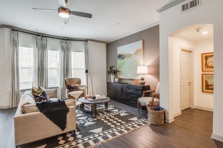 a living room with a couch and a table