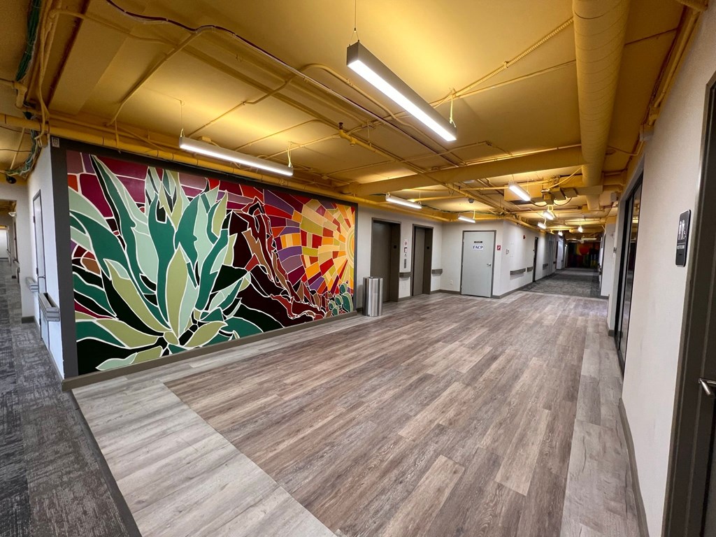 a large mural in the middle of a room