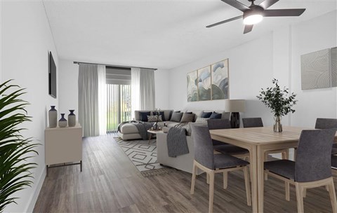 A modern living room with a dining table and grey chairs.