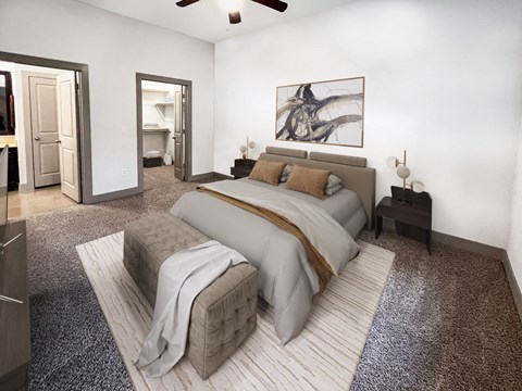 a bedroom with white walls and gray carpet