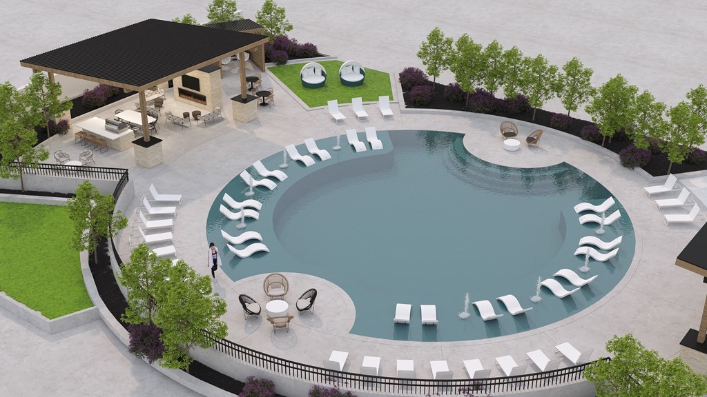 an aerial view of an outdoor pool with chairs and a pavilion