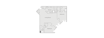 A floor plan of a house with a kitchen, living room, and two bedrooms.