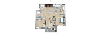 A top-down view of apartment B2 showing a living room, kitchen, and two bedrooms.
