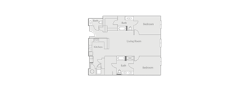 A floor plan of a house with two bathrooms, two bedrooms, a living room, and a kitchen.