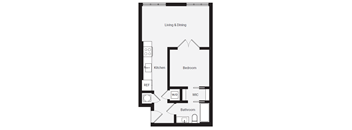 A floor plan of a living and dining area with a kitchen, bathroom, and bedroom.