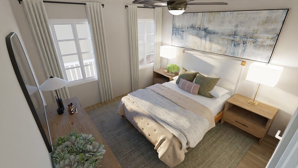 a bedroom with a bed and a painting on the wall