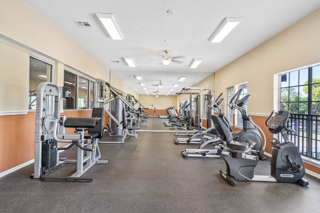 the gym at the enclave at woodbridge apartments in sugar land, tx