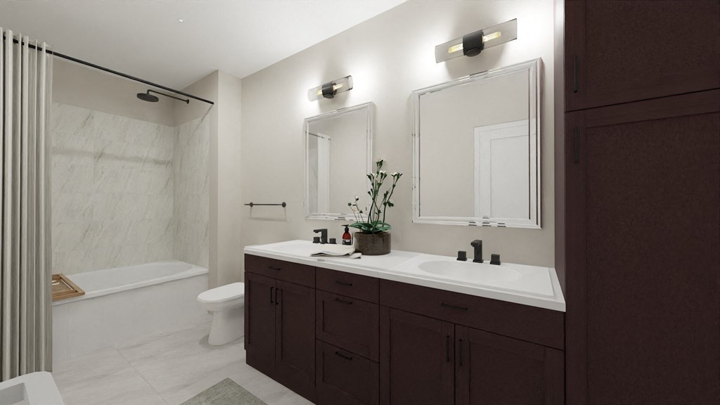 a bathroom with a sink and a shower and a toilet