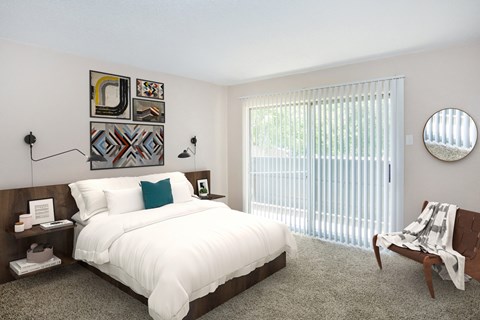 A bedroom with a large bed and a chair.