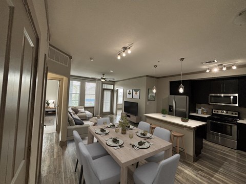 a rendering of a kitchen and dining room in an apartment