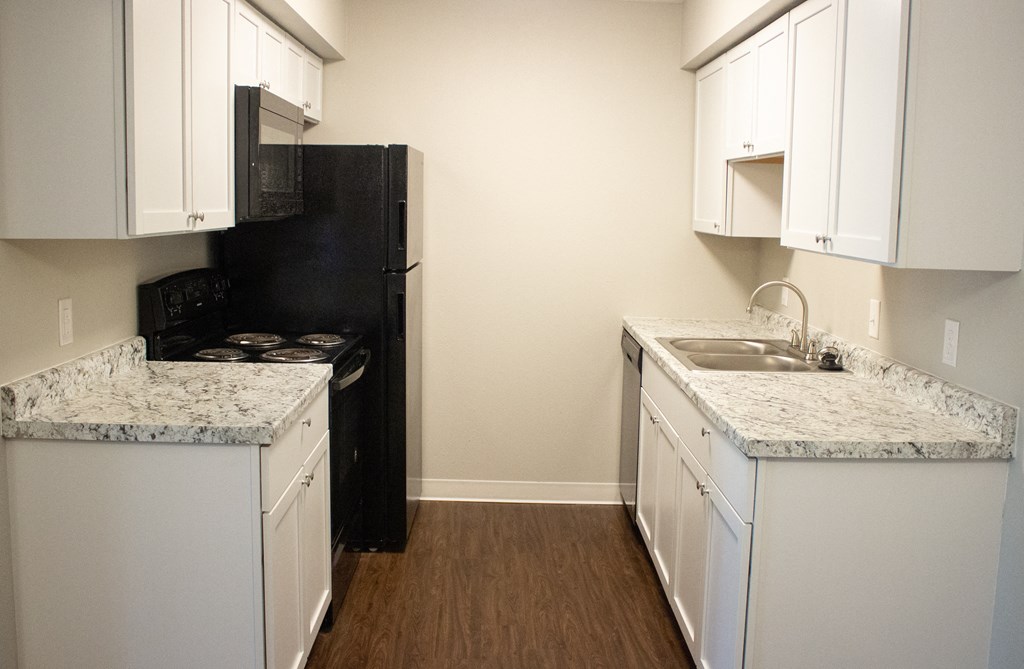spacious kitchen view with great appliances
