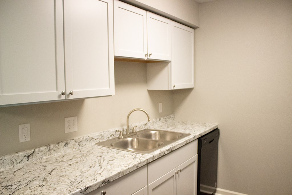 Kitchen view with built in shelving