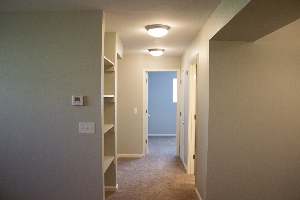 hallway view with shelves