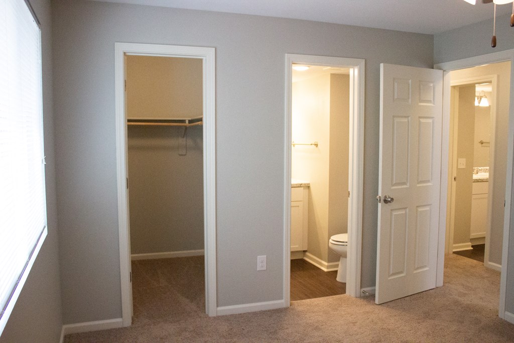 master bedroom with bathroom and nice size closet